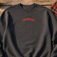 Arkansas State Upside Down embroidery design stitched on a heavyweight fleece crewneck sweatshirt