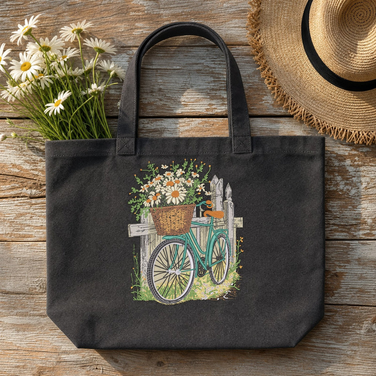Bike Basket Fence embroidery design stitched on a heavy-weight charcoal canvas tote bag