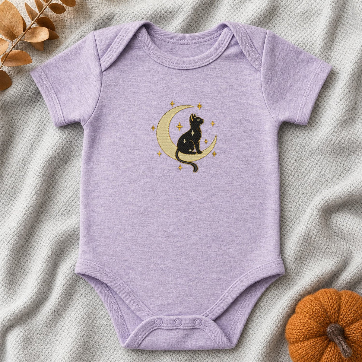 Cat Moon Stars embroidery design stitched on a heather lavender baby onesie