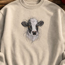 Cow Head Threads embroidery design stitched on a heavyweight fleece crewneck sweatshirt