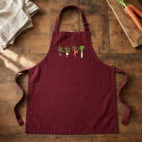 Garden Veggies embroidery design stitched on a maroon cotton full-bib kitchen apron