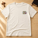 God is Love JESUS embroidery design stitched on a natural unisex short-sleeve tee