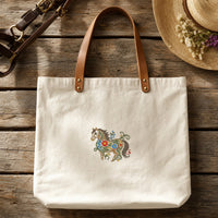 Horse Filled Flowers embroidery design stitched on a natural cream canvas tote bag