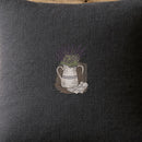 Jug Vace Lavender embroidery design stitched on a 16x16 charcoal linen throw pillow