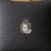 Jug Vace Lavender embroidery design stitched on a 16x16 charcoal linen throw pillow