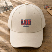 LON Puff Cap embroidery design stitched on a natural structured baseball cap