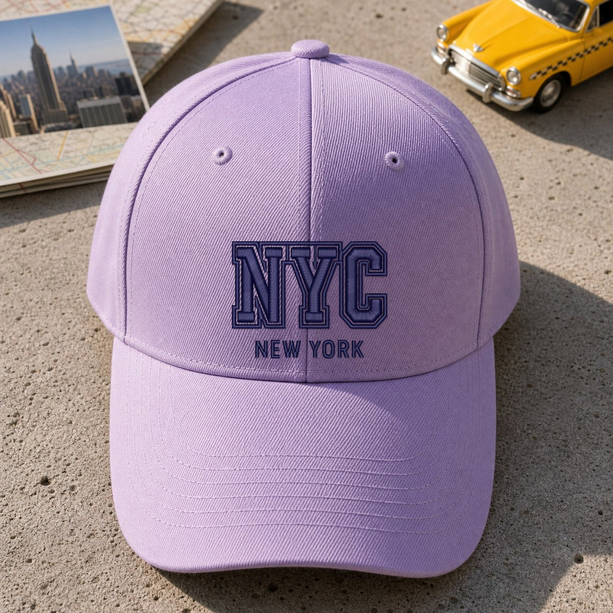 NYC Puff Cap embroidery design stitched on a light lavender structured six-panel baseball cap