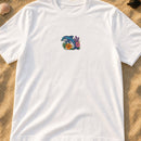 Ocean Dolphin Floral embroidery design stitched on a crisp white unisex midweight crewneck tee