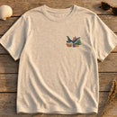 Ocean Manta Ray Floral embroidery design stitched on a heather sand relaxed-fit short-sleeve tee