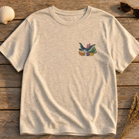 Ocean Manta Ray Floral embroidery design stitched on a heather sand relaxed-fit short-sleeve tee