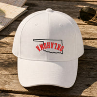 Oklahoma State Upside Down embroidery design stitched on a white structured six-panel baseball cap