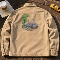 Peek at New York embroidery design stitched on the back of a tan twill chore jacket