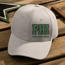 PHI Puff Cap embroidery design stitched on a light heather grey structured six-panel baseball cap