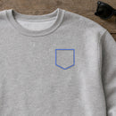 Pocket Applique Patch 1 embroidery design stitched on a light heather grey unisex crewneck sweatshirt