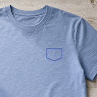 Pocket Applique Patch 5 embroidery design stitched as a left-chest pocket on a sand slub tee
