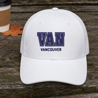 VAN Puff Cap embroidery design stitched on a white structured six-panel baseball cap