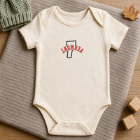 Vermont State Upside Down embroidery design stitched on a soft natural organic cotton baby onesie